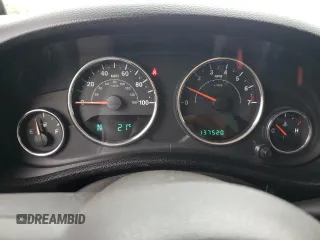 2012 Jeep Wrangler Sport z VIN 1C4AJWAG7CL105511, wystawiony jako Copart lot #62822985 z przebiegiem 137 520 mil mil oraz Czysty tytuł • Clean title. Historia ofert i sprzedaży dostępna na DreamBid. Obrazek 9.