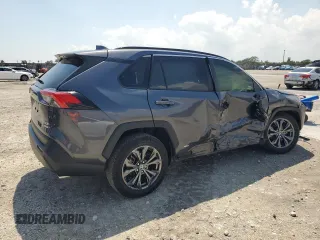 2023 Toyota RAV4 Hybrid XLE Premium z VIN JTMB6RFV2PD105642, wystawiony jako Copart lot #50714615 z przebiegiem Nie podano mil oraz Szkoda całkowita • Salvage title. Historia ofert i sprzedaży dostępna na DreamBid. Obrazek 3.