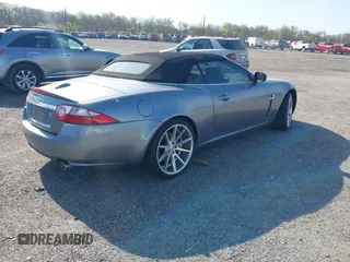 2007 Jaguar XK with VIN SAJWA44B075B11143, listed as a IAAI auction lot 42044257 with 122,842 mi miles. Bid and sale history available at carsss.com. Image 4.