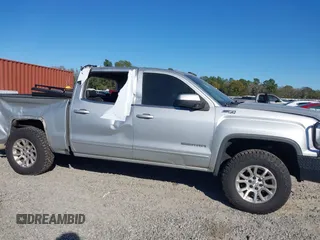 2017 GMC Sierra 1500 SLE with VIN 3GTU2MEC3HG199980, listed as a IAAI auction lot 40534708 with 129,765 mi miles and . Bid and sale history available at DreamBid. Image 13.