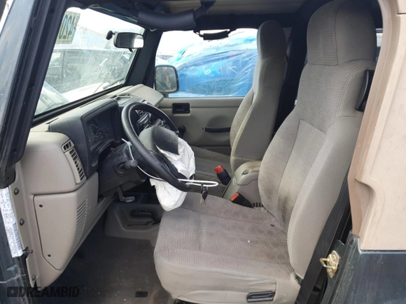 2004 Jeep Wrangler Sport with VIN 1J4FA49S24P752406, listed as a Copart auction lot 42060685 with 139,457 mi miles and Salvage Title. Bid and sale history available at carsss.com. Image 7.