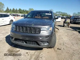 2019 Jeep Grand Cherokee Summit with VIN 1C4RJFJGXKC655979, listed as a Copart auction lot 73033194 with 121,720 mi miles and Salvage title. Bid and sale history available at DreamBid. Image 13.