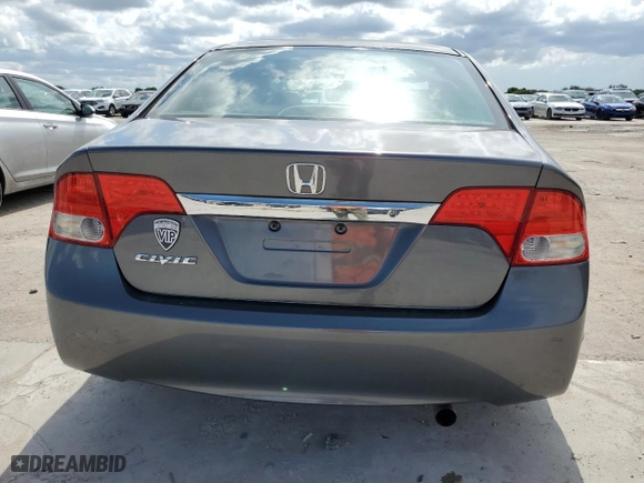 2010 Honda Civic Sdn LX with VIN 2HGFA1F53AH571030, listed as a Copart auction lot 57039113 with 100,223 mi miles and Salvage Title. Bid and sale history available at carsss.com. Image 6.