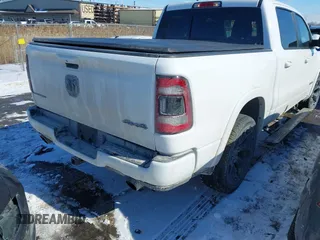 2021 Ram 1500 Limited with VIN 1C6SRFHT5MN548477, listed as a IAAI auction lot 41644894 with 51,429 mi miles and . Bid and sale history available at DreamBid. Image 4.