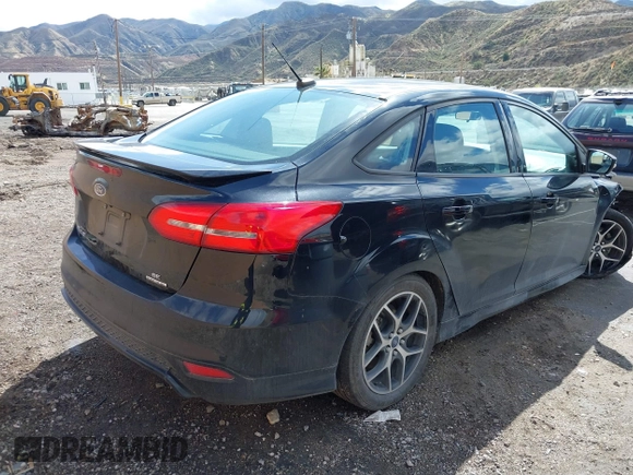 2016 Ford Focus SE with VIN 1FADP3F29GL209601, listed as a IAAI auction lot 41744560 with 68,058 mi miles. Bid and sale history available at carsss.com. Image 4.