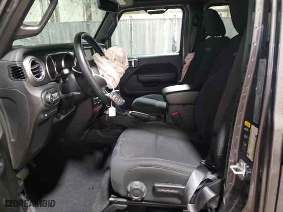 2022 Jeep Wrangler 4xe Unlimited Rubicon with VIN 1C4JJXR65NW274221, listed as a Copart auction lot 49138365 with 25,218 mi miles and Salvage Title. Bid and sale history available at carsss.com. Image 7.