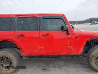2017 Jeep Wrangler Unlimited 75th Anniversary z VIN 1C4BJWEG6HL575731, wystawiony jako IAAI lot #41704339 z przebiegiem 73 742 mil mil oraz . Historia ofert i sprzedaży dostępna na DreamBid. Obrazek 14.