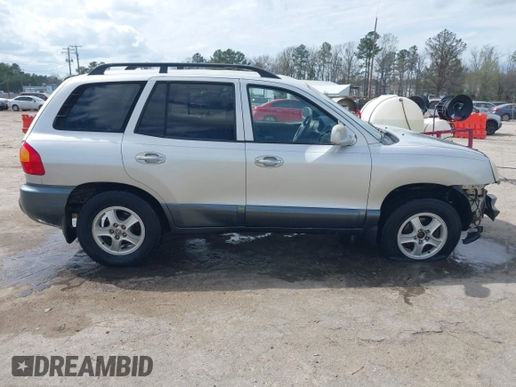 2002 Hyundai Santa Fe GLS with VIN KM8SC73D62U209998, listed as a IAAI auction lot 41915060 with 228,451 mi miles. Bid and sale history available at carsss.com. Image 13.