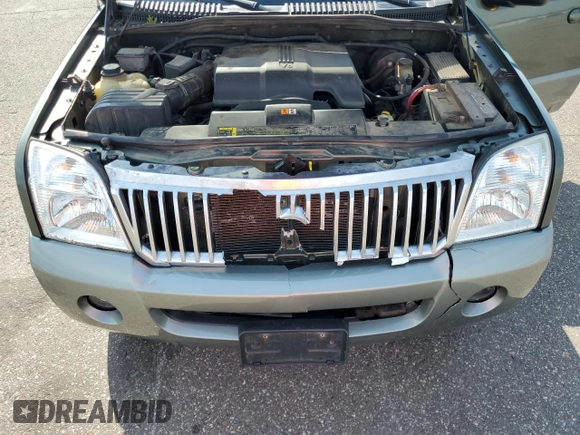 2002 Mercury Mountaineer Convenience with VIN 4M2ZU86W32ZJ21734, listed as a Copart auction lot 59169985 with 198,796 mi miles and Salvage title. Bid and sale history available at DreamBid. Image 12.