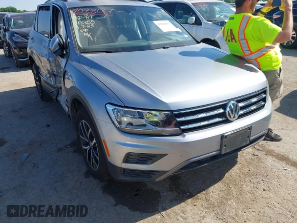 2021 Volkswagen Tiguan SE with VIN 3VV3B7AX0MM026064, listed as a IAAI auction lot 42038137 with 18,526 mi miles and . Bid and sale history available at DreamBid. Image 1.