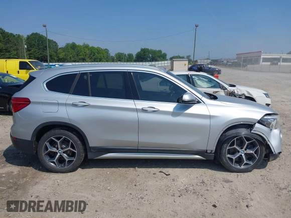 2018 BMW X1 xDrive28i with VIN WBXHT3C39J5L27926, listed as a IAAI auction lot 42582330 with 101,197 mi miles and . Bid and sale history available at DreamBid. Image 13.
