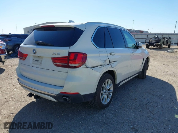 2014 BMW X5 sDrive35i with VIN 5UXKR2C53E0C01692, listed as a IAAI auction lot 41727216 with 135,985 mi miles. Bid and sale history available at carsss.com. Image 4.
