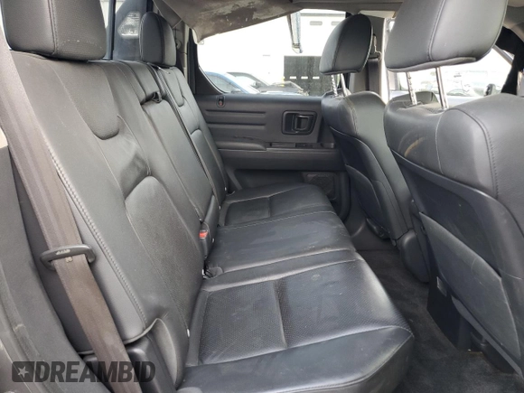 2012 Honda Ridgeline RTL с VIN 5FPYK1F56CB456555, выставлен на аукционе Copart как лот 54237205 с пробегом 191 967 миль миль и Списание • Salvage title. История ставок и продаж доступна на DreamBid. Изображение 10.