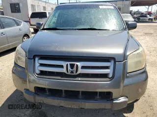 2007 Honda Pilot EX-L with VIN 2HKYF18517H510801, listed as a Copart auction lot 55170005 with 149,212 mi miles and Salvage Title. Bid and sale history available at carsss.com. Image 5.