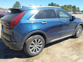 2019 Cadillac XT4 FWD Premium Luxury z VIN 1GYFZCR47KF109394, wystawiony jako IAAI lot #41864606 z przebiegiem 98 425 mil mil oraz . Historia ofert i sprzedaży dostępna na DreamBid. Obrazek 4.