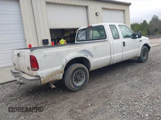2004 Ford Super Duty F-250 XL with VIN 1FTNX20L34EA13731, listed as a IAAI auction lot 41510742 with 323,217 mi miles. Bid and sale history available at carsss.com. Image 4.