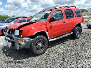 2000 Nissan Xterra XE z VIN 5N1ED28T1YC584094, wystawiony jako Copart lot #55646125 z przebiegiem 215 920 mil mil oraz Szkody całkowita. Historia ofert i sprzedaży dostępna na DreamBid. Obrazek 1.