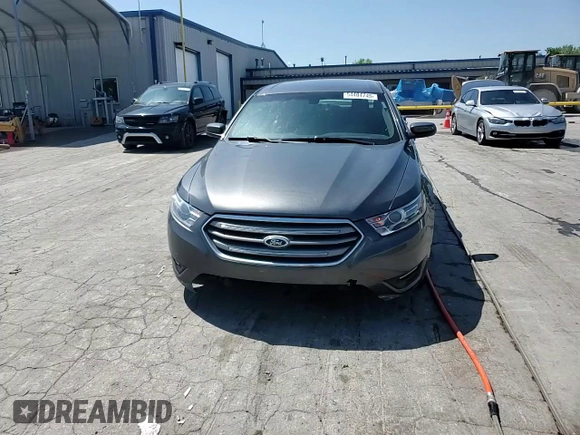 2015 Ford Taurus SEL z VIN 1FAHP2E83FG125234, wystawiony jako Copart lot #54404745 z przebiegiem 107 311 mil mil oraz Szkody całkowita. Historia ofert i sprzedaży dostępna na DreamBid. Obrazek 14.