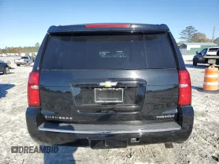 2019 Chevrolet Suburban Premier with VIN 1GNSKJKJXKR323704, listed as a Copart auction lot 72757214 with 150,404 mi miles and Salvage Title. Bid and sale history available at DreamBid. Image 6.