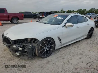 2020 BMW 8 Series M850i z VIN WBAGV8C05LCD42136, wystawiony jako Copart lot #49142544 z przebiegiem Nie podano mil oraz Szkoda całkowita • Salvage title. Historia ofert i sprzedaży dostępna na DreamBid. Obrazek 1.