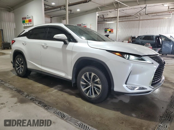 2022 Lexus RX with VIN 2T2HZMDA4NC338142, listed as a Copart auction lot 52144555 with 31,426 mi miles and Salvage Title. Bid and sale history available at carsss.com. Image 4.