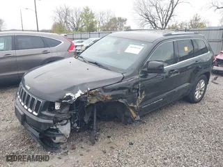 2014 Jeep Grand Cherokee Laredo with VIN 1C4RJFAG6EC577642, listed as a IAAI auction lot 40890558 with 166,021 mi miles. Bid and sale history available at carsss.com. Image 17.