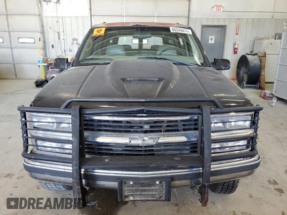 1999 Chevrolet Suburban with VIN 1GNGK26J6XJ444189, listed as a Copart auction lot 68249474 with 216,412 mi miles and Salvage Title. Bid and sale history available at carsss.com. Image 5.