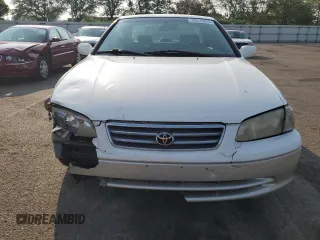 2001 Toyota Camry LE z VIN JT2BF22K010297055, wystawiony jako Copart lot #59510645 z przebiegiem 265 428 mil mil oraz Szkoda całkowita • Salvage title. Historia ofert i sprzedaży dostępna na DreamBid. Obrazek 5.