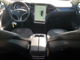 2013 Tesla Model S with VIN 5YJSA1AC7DFP10881, listed as a Copart auction lot 61485235 with 107,032 mi miles and Salvage title. Bid and sale history available at DreamBid. Image 8.