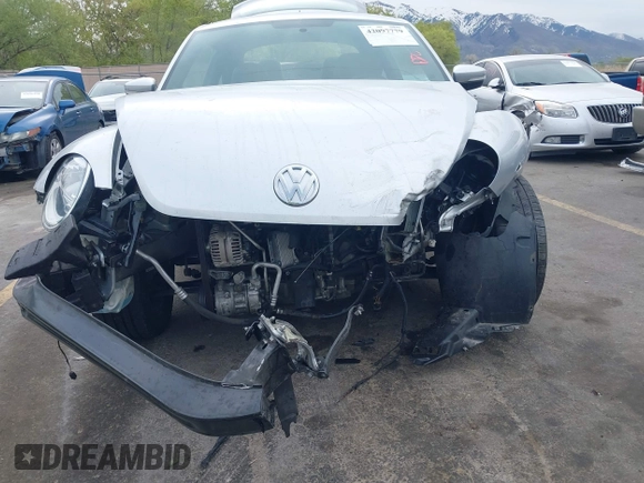 2013 Volkswagen Beetle with VIN 3VWHX7ATXDM658134, listed as a IAAI auction lot 42097779 with 47,901 mi miles and . Bid and sale history available at DreamBid. Image 6.