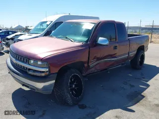 1999 Chevrolet Silverado 1500 LS with VIN 2GCEK19T2X1250583, listed as a IAAI auction lot 41858943 with 267,610 mi miles. Bid and sale history available at carsss.com. Image 2.