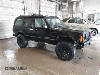 1998 Jeep Cherokee Sport z VIN 1J4FJ68SXWL281659, wystawiony jako IAAI lot #42208563 z przebiegiem 203 992 mil mil oraz . Historia ofert i sprzedaży dostępna na DreamBid. Obrazek 1.