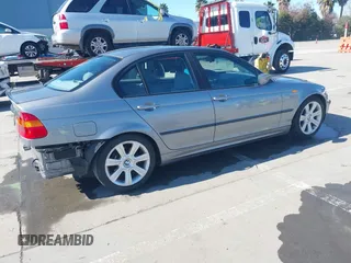 2003 BMW 3 Series 325i with VIN WBAAZ334X3KP81397, listed as a IAAI auction lot 41633863 with 128,133 mi miles and . Bid and sale history available at DreamBid. Image 4.