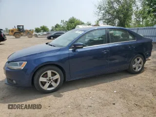 2014 Volkswagen Jetta Comfortline z VIN 3VWDL7AJXEM312546, wystawiony jako Copart lot #58665745 z przebiegiem 232 596 mil mil oraz Czysty tytuł • Clean title. Historia ofert i sprzedaży dostępna na DreamBid. Obrazek 1.