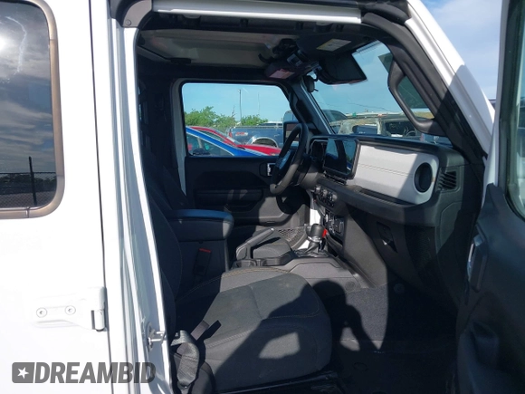 2024 Jeep Wrangler Sport S with VIN 1C4PJXDG5RW244037, listed as a IAAI auction lot 42322052 with 29,580 mi miles and . Bid and sale history available at DreamBid. Image 5.