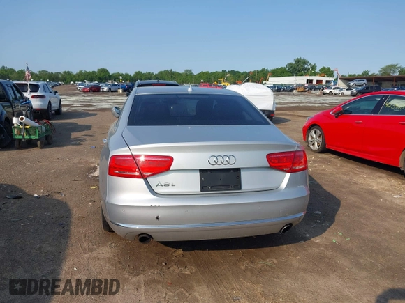 2013 Audi A8 3.0L с VIN WAURGAFD7DN016351, выставлен на аукционе IAAI как лот 42372202 с пробегом 90 753 миль миль и . История ставок и продаж доступна на DreamBid. Изображение 16.