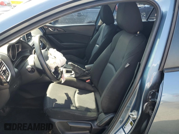 2014 Mazda 3 i Sport with VIN JM1BM1U77E1114315, listed as a Copart auction lot 56091515 with 167,013 mi miles and Salvage Title. Bid and sale history available at DreamBid. Image 7.