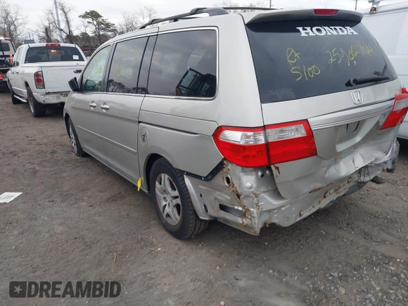 2005 Honda Odyssey EX with VIN 5FNRL38435B071998, listed as a IAAI auction lot 41808601 with 999,999 mi miles. Bid and sale history available at carsss.com. Image 3.