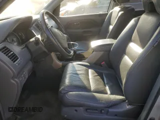 2006 Honda Pilot EX-L with VIN 2HKYF18786H544413, listed as a Copart auction lot 82155654 with 80,434 mi miles and Salvage Title. Bid and sale history available at DreamBid. Image 7.
