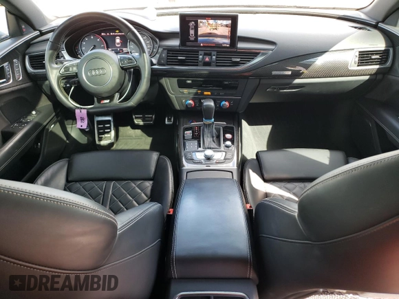2018 Audi S7 Prestige z VIN WAU2FAFC1JN090694, wystawiony jako Copart lot #72414024 z przebiegiem 71 184 mil mil oraz Szkody całkowita. Historia ofert i sprzedaży dostępna na DreamBid. Obrazek 8.