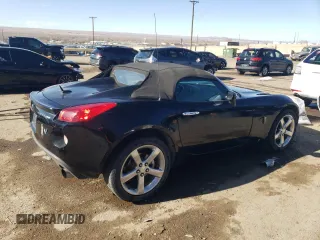 2009 Pontiac Solstice GXP z VIN 1G2MT35X19Y105245, wystawiony jako Copart lot #89054685 z przebiegiem 141 283 mil mil oraz Szkoda całkowita • Salvage title. Historia ofert i sprzedaży dostępna na DreamBid. Obrazek 3.