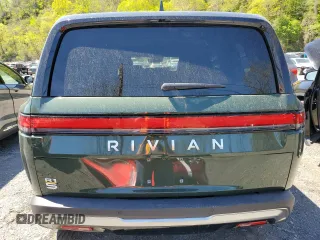 2022 Rivian R1S Launch Edition z VIN 7PDSGABLXNN002875, wystawiony jako Copart lot #55218465 z przebiegiem 25 988 mil mil oraz Szkody całkowita. Historia ofert i sprzedaży dostępna na DreamBid. Obrazek 6.