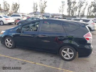 2017 Toyota Prius v Two with VIN JTDZN3EU1HJ066102, listed as a IAAI auction lot 41429125 with 168,152 mi miles. Bid and sale history available at carsss.com. Image 14.