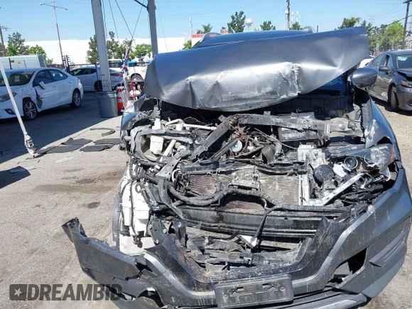 2017 Nissan Rogue S with VIN JN8AT2MV9HW263307, listed as a IAAI auction lot 42317181 with 114,445 mi miles and . Bid and sale history available at DreamBid. Image 12.