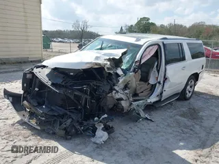 2017 Chevrolet Suburban Premier with VIN 1GNSKJKC0HR288648, listed as a IAAI auction lot 41579677 with Not Provided miles and . Bid and sale history available at DreamBid. Image 16.