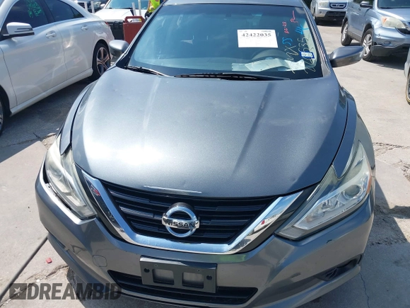 2017 Nissan Altima SV with VIN 1N4AL3AP7HC220535, listed as a IAAI auction lot 42422035 with 102,346 mi miles and . Bid and sale history available at DreamBid. Image 12.