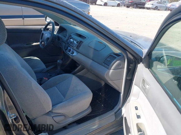 2003 Toyota Camry LE with VIN 4T1BE32K63U659008, listed as a IAAI auction lot 41790929 with 206,878 mi miles and . Bid and sale history available at DreamBid. Image 5.