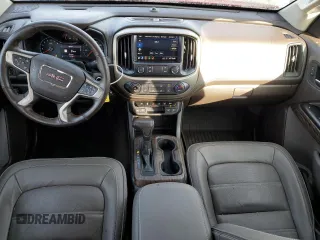 2021 GMC Canyon 2WD Denali with VIN 1GTG5EEN7M1254810, listed as a Copart auction lot 84808244 with 32,726 mi miles and Salvage Title. Bid and sale history available at carsss.com. Image 8.