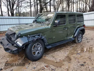 2022 Jeep Wrangler Unlimited Sport with VIN 1C4HJXDG2NW201368, listed as a Copart auction lot 87492374 with 50,375 mi miles and Salvage Title. Bid and sale history available at DreamBid. Image 1.