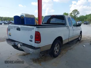 1999 Ford F-150 z VIN 1FTRX17W5XNB33627, wystawiony jako IAAI lot #41933365 z przebiegiem 207 118 mil mil oraz . Historia ofert i sprzedaży dostępna na DreamBid. Obrazek 4.